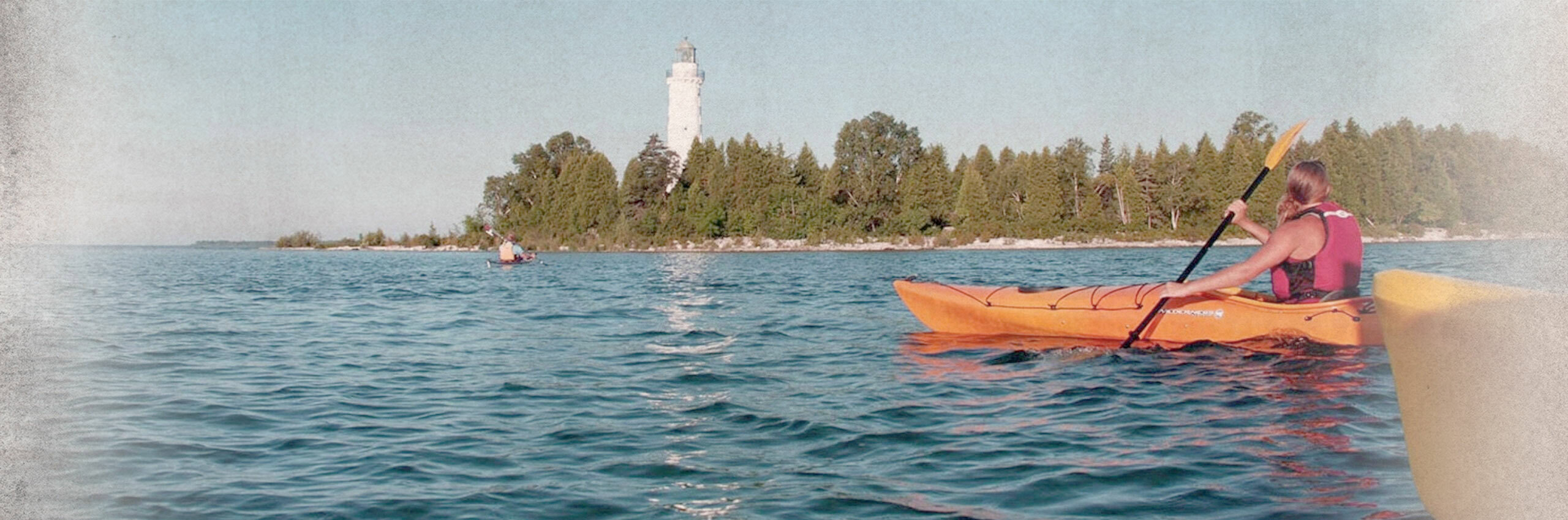 Cana Island and woman kayaking